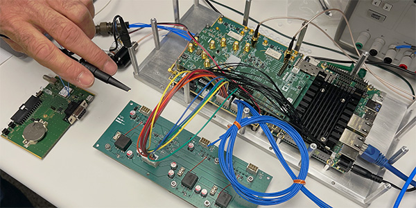 Engineer working at a benchtop RF test setup